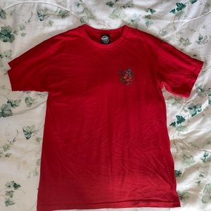Red worn Santa Cruz small men’s t-shirt.
